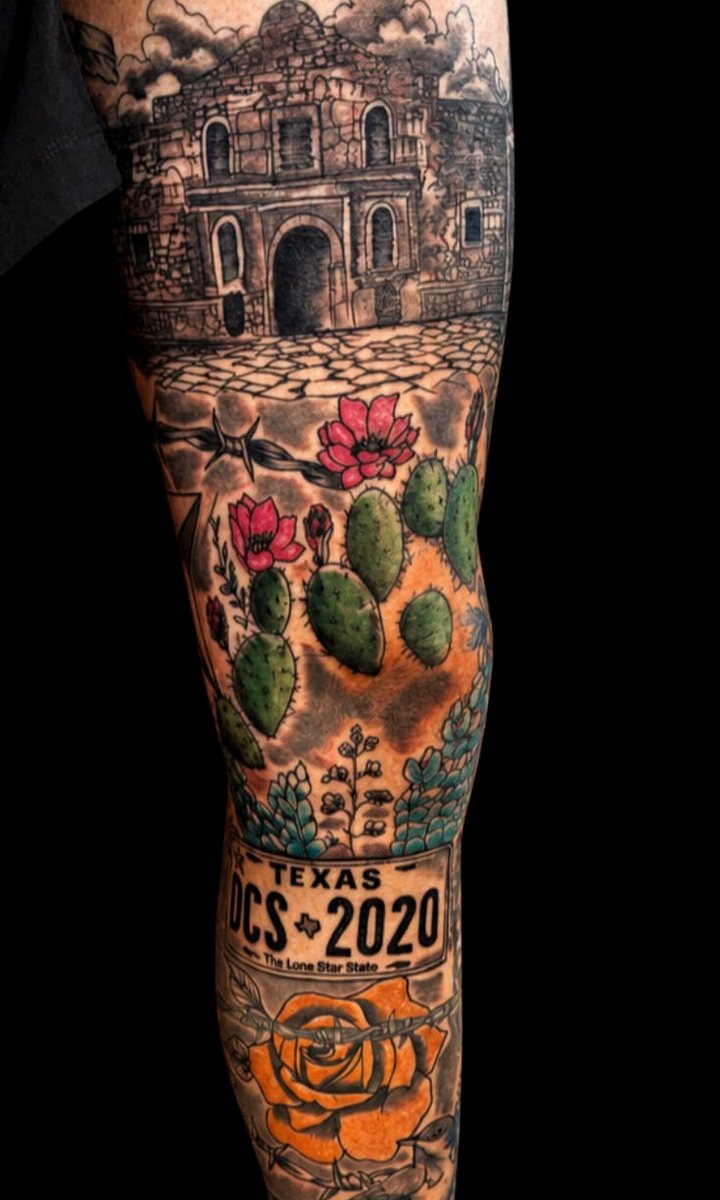 Full-color Texas leg sleeve — the Alamo above prickly pear in bloom and a Lone Star plate, running the length of the shin.